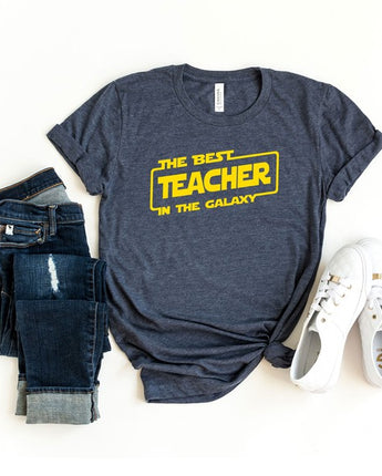 Olive and Ivory Best Teacher In The Galaxy Short Sleeve Tee (XS-XL)