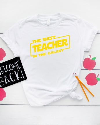 Olive and Ivory Best Teacher In The Galaxy Short Sleeve Tee (XS-XL)