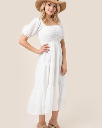 Tiered long dress with puff sleeves